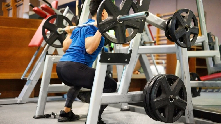 back squats, leg strength, squat form, barbell squats, lower body workout, strength training, squat benefits, muscle growth, fitness routine, progressive overload